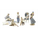 A collection of Lladro figures,