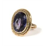 A gold synthetic colour change sapphire ring,
