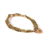 A gold gate bracelet,