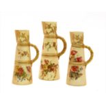 A pair of Royal Worcester blush ivory jugs,