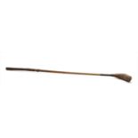 A wooden headed longnose golf club,