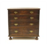 An oak chest of drawers,