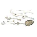 A silver ladle,