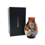 A Moorcroft vase in the tulip pattern,