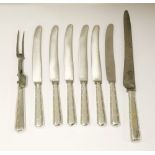 A set of eighteen George III and later table knives,