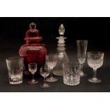 A collection of cut and plain glassware,