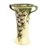 A William Moorcroft Macintyre twin-handled 'Wisteria' vase,