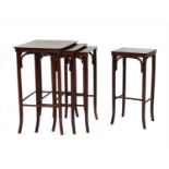 A nest of four bentwood tables,