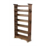 An Arts & Crafts six-tier open bookshelf,