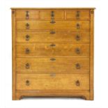 A Gillows oak chest of drawers,