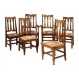 A set of six Arts & Crafts oak chairs,