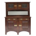 An Arts & Crafts oak cabinet,