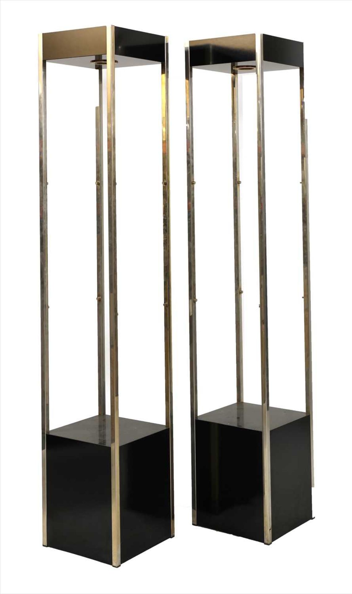 A pair of modern chrome stands,