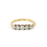 A gold five stone diamond ring,