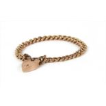 A 9ct gold graduated curb link bracelet,