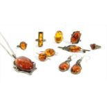 A quantity of silver amber set jewellery,