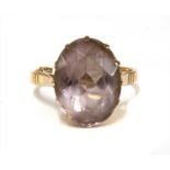 A gold single stone amethyst ring,