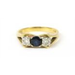 A gold sapphire and diamond ring,