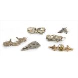 A quantity of Victorian and later brooches,