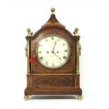 A large Regency mahogany and boxwood line inlaid bracket clock,