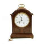 An Edwardian mahogany and gilt mantle clock,