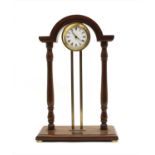 A 20th century mahogany and gilt brass mystery clock