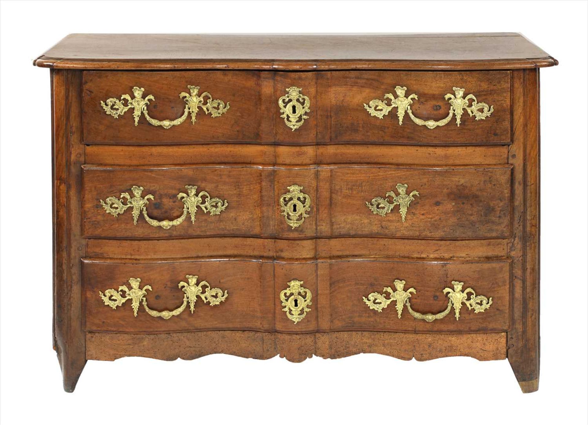 A Régence walnut commode,