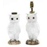 A pair of pottery owl table lamp bases,