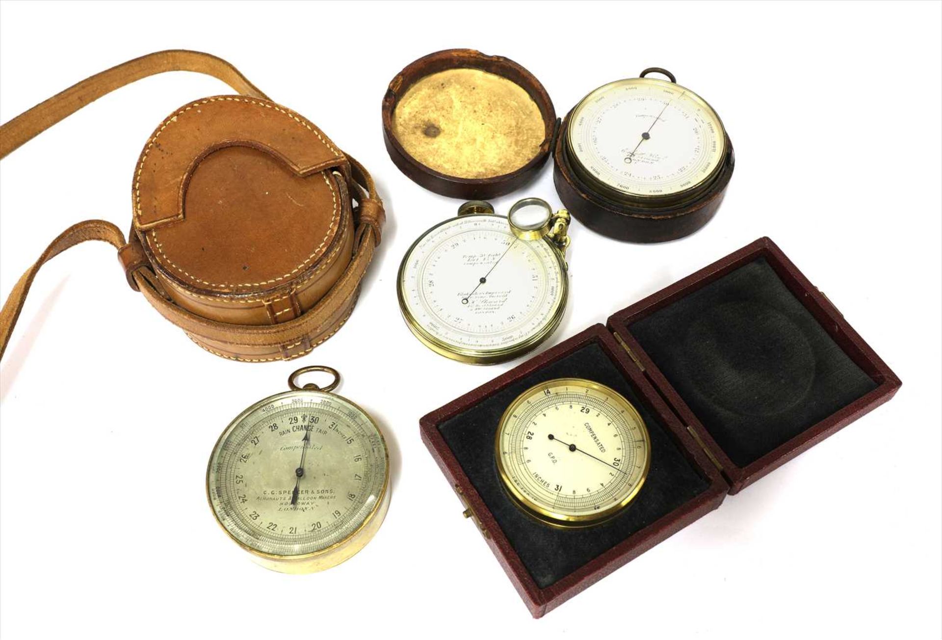 Four aneroid barometers,