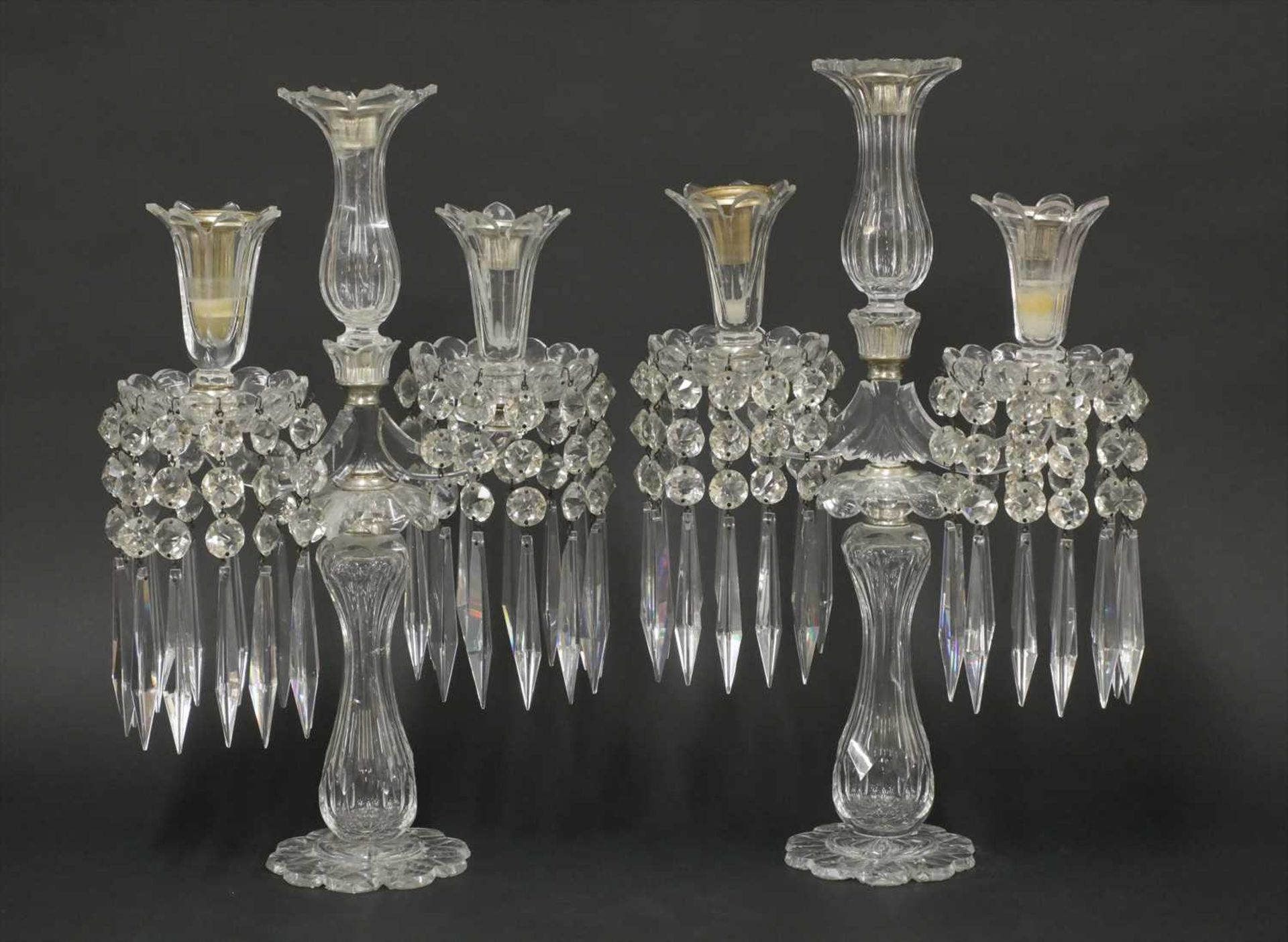 A pair of cut-glass candelabra