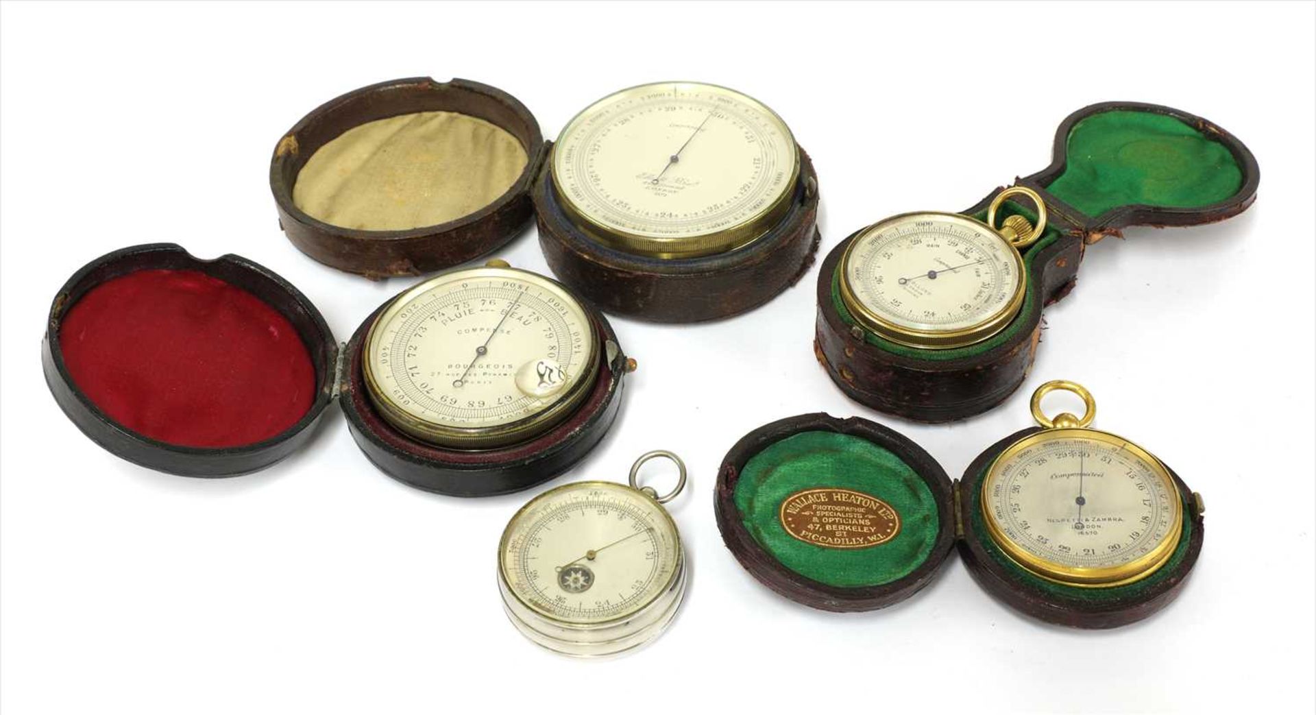 Five pocket aneroid barometer/altimeters,