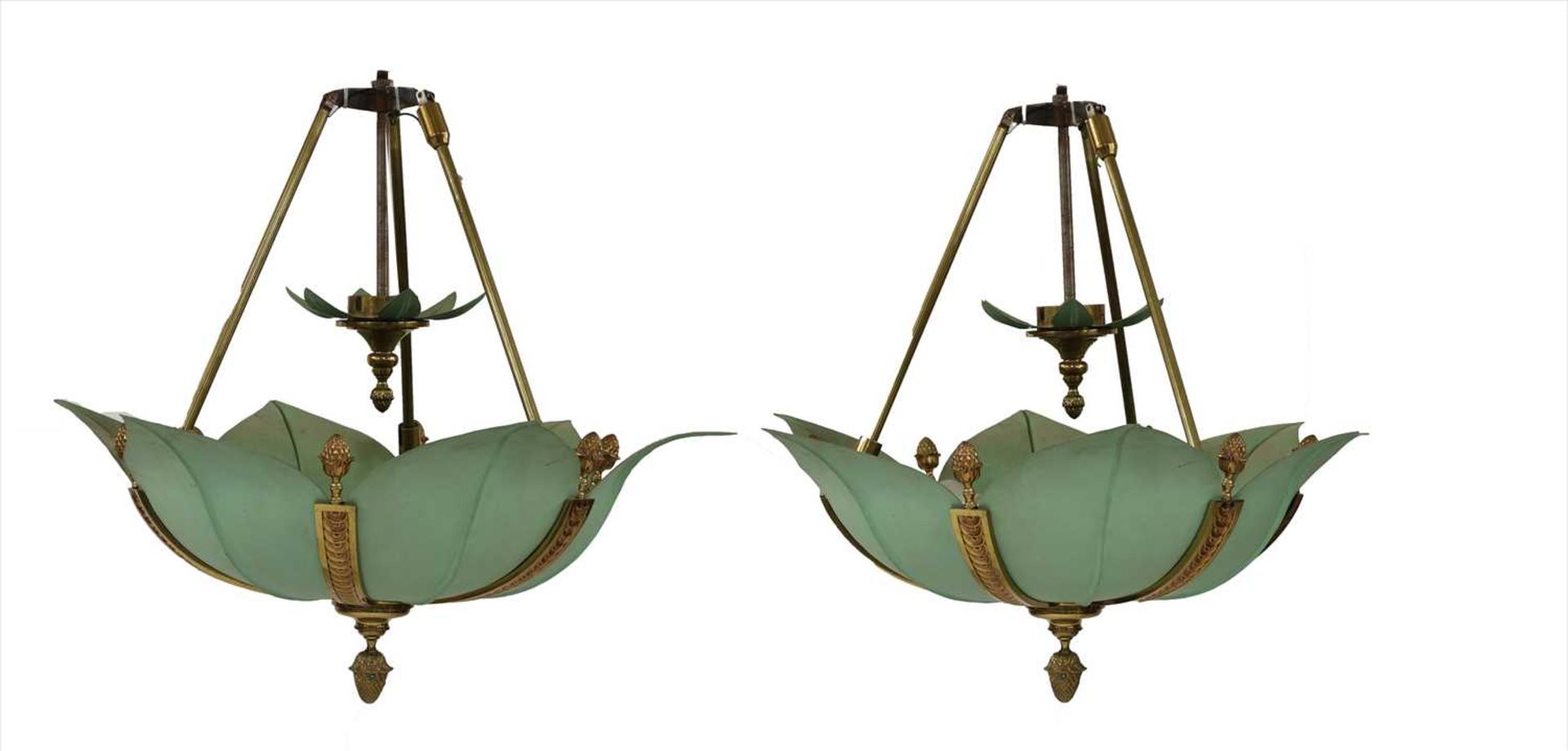 A pair of patinated metal ceiling lights,