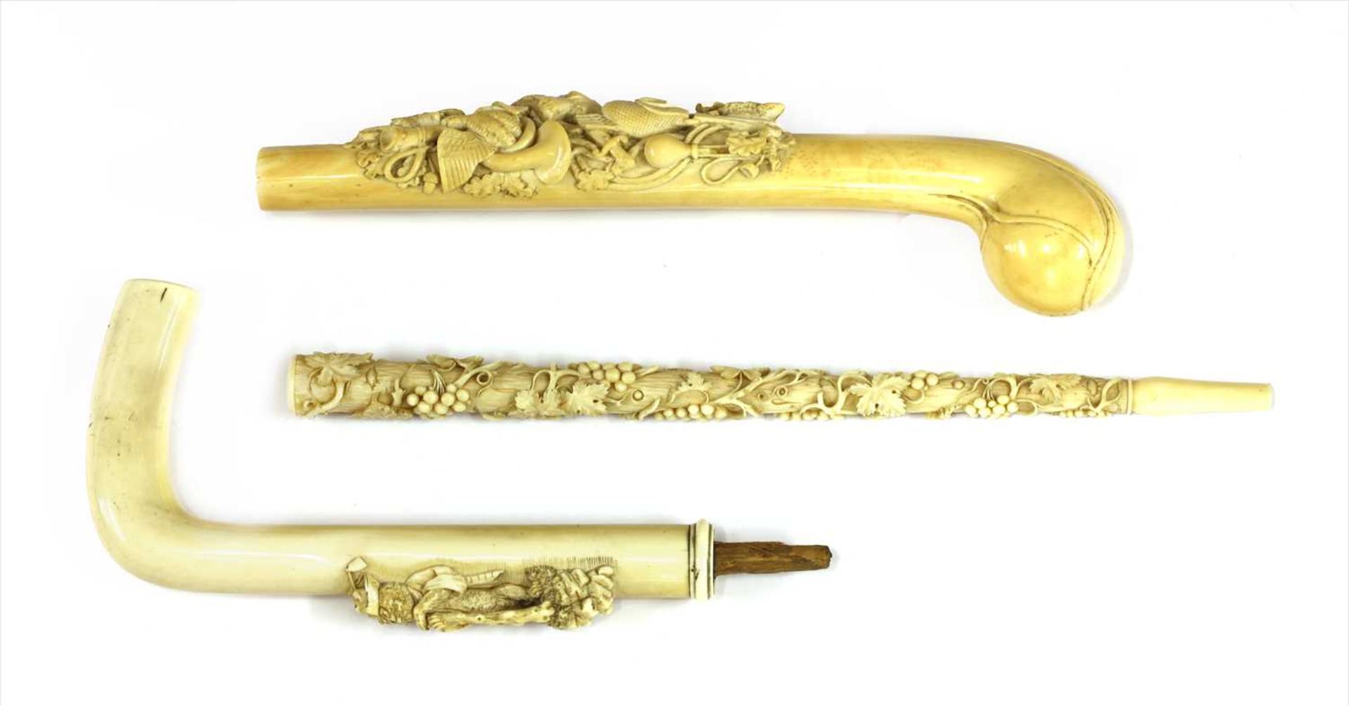 Three carved ivory parasol or walking stick handles, - Image 2 of 2