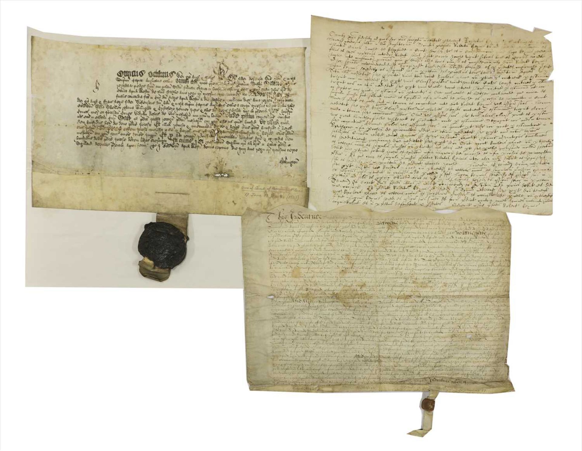 Three medieval parchment documents,