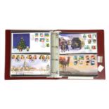 An album of GB Christmas stamps,