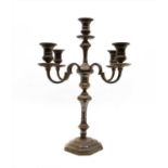 A silver plated four branch candelabra