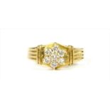 A gold diamond cluster ring