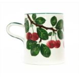 A Wemyss pottery mug,