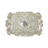 A silver dressing table tray,