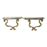 A pair of marble and ormolou table consoles,