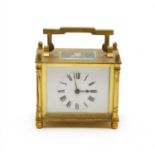 A modern brass carriage clock,