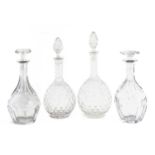 Four cut -glass decanters and stoppers,