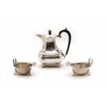 Silver items: a coffee pot,