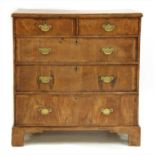 A Queen Anne walnut chest of drawers,