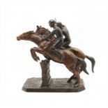 A patinated bronze equestrian group,