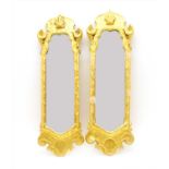 A pair of gilt wall mirrors,
