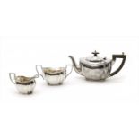 An Edwardian three piece tea set,