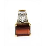 A 9ct gold garnet pendant,