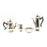 A modern silver four piece tea set,