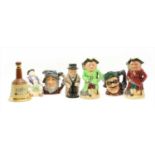 A collection of character jugs,